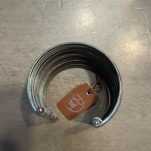Sturdy wire like material, cuff style